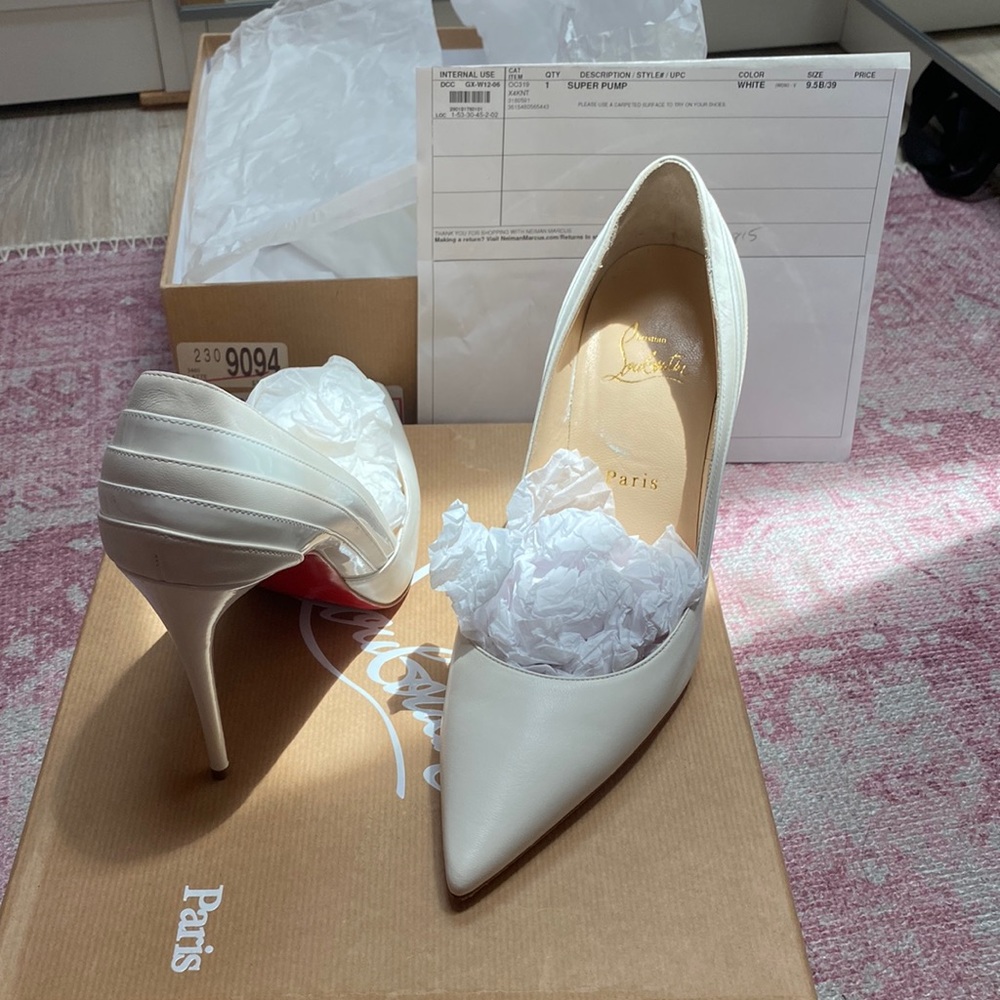 White Christian Louboutin worn once